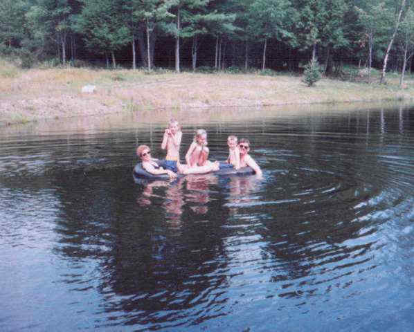 Zona family in pond